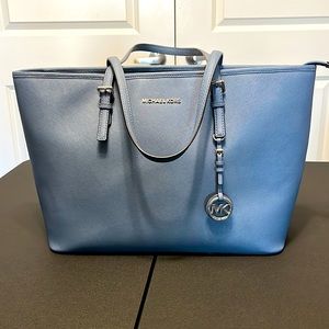 Michael Kors blue/grey leather bag with tons of pockets inside. Like new.